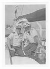 Lloyd Bridges and a U.S. Coast Guard member on a boat